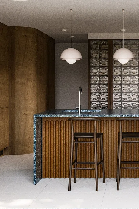 Stylish kitchen with wooden doors, green marble island, terracotta back, and textured glass block wall.