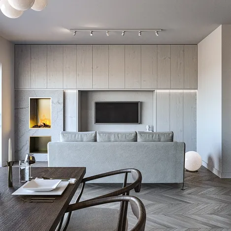 Open plan living and dining room with dark wood table, white sphere lighting, a comfortable sofa, and built-in cabinetry.